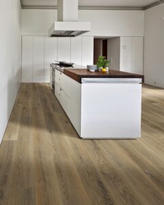 Kitchen with Coastal Cottage of Amelia wood floor, cabinetry, countertops, sink, ceiling details, tiles, and hardwood elements.