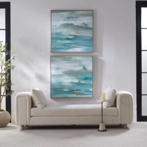 Two large abstract paintings displayed on the wall of a stylish living room, enhancing the modern decor.